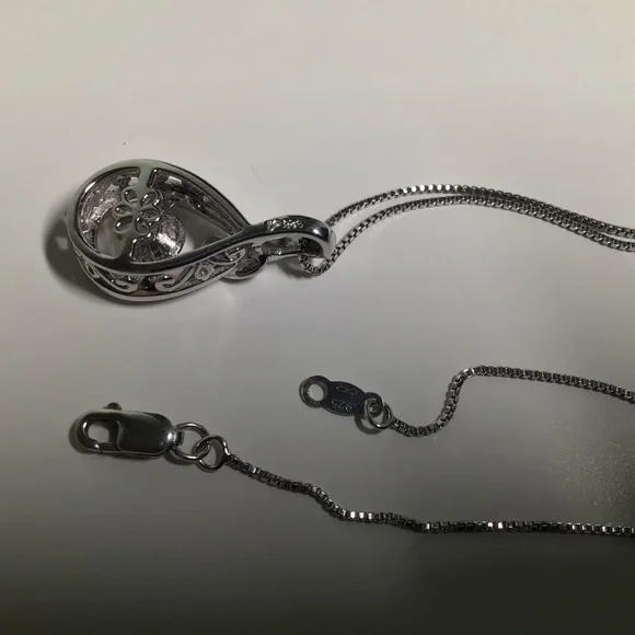 Kay Jewelers Infinity Teardrop Pendant with Free-floating Stone. - Picture 5 of 10